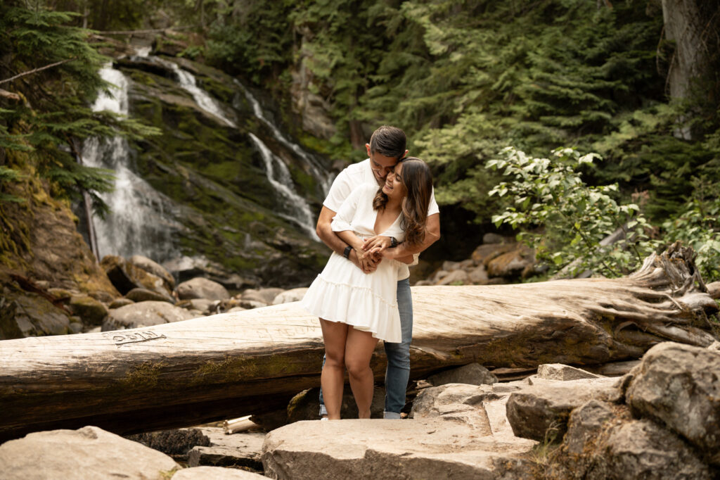 Couple by waterfall taken by Idaho Elopement Photographer