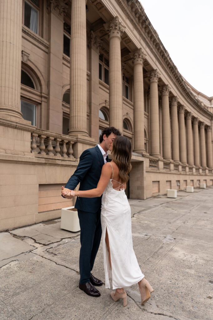 Engaged couple running taken by Spokane Washington Photographer.