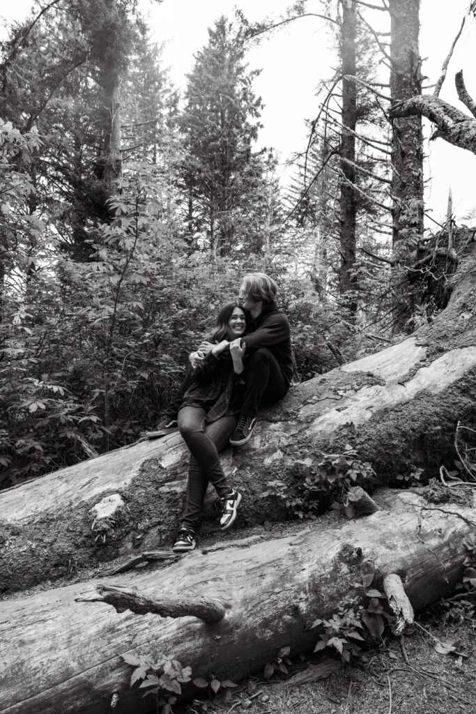 Engaged couple hugging taken by Oregon engagement photographer.
