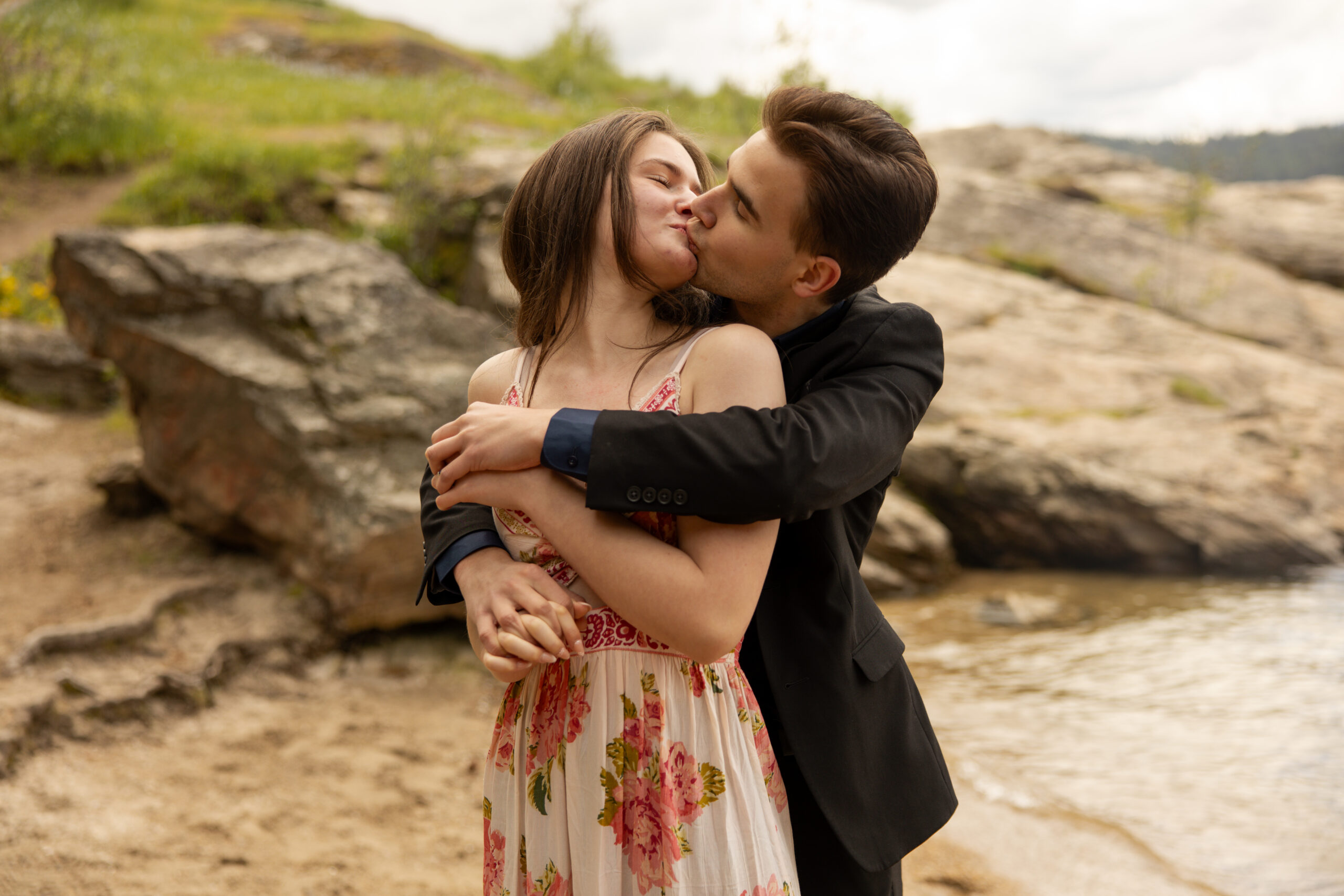 Engaged couple kissing taken by photographers in Idaho