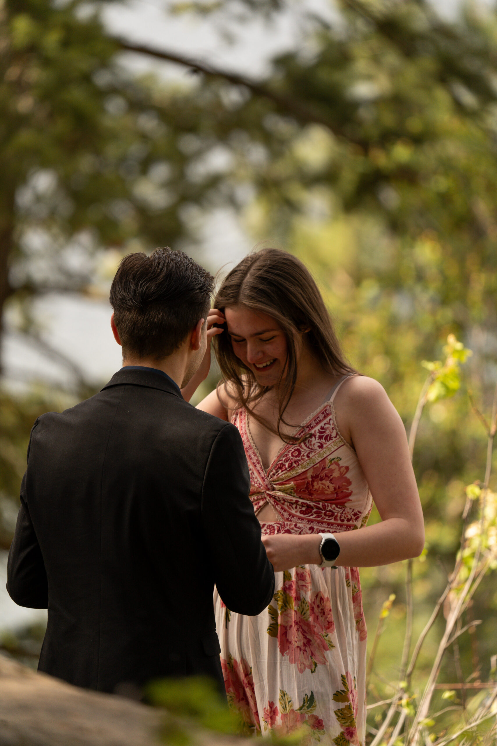 Engaged couple smiling taken by photographers in Idaho