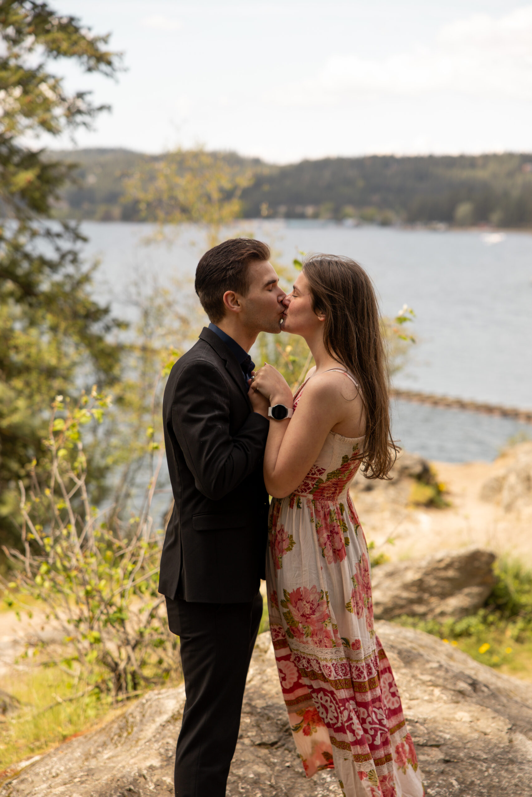Engaged couple kissing taken by photographers in Idaho