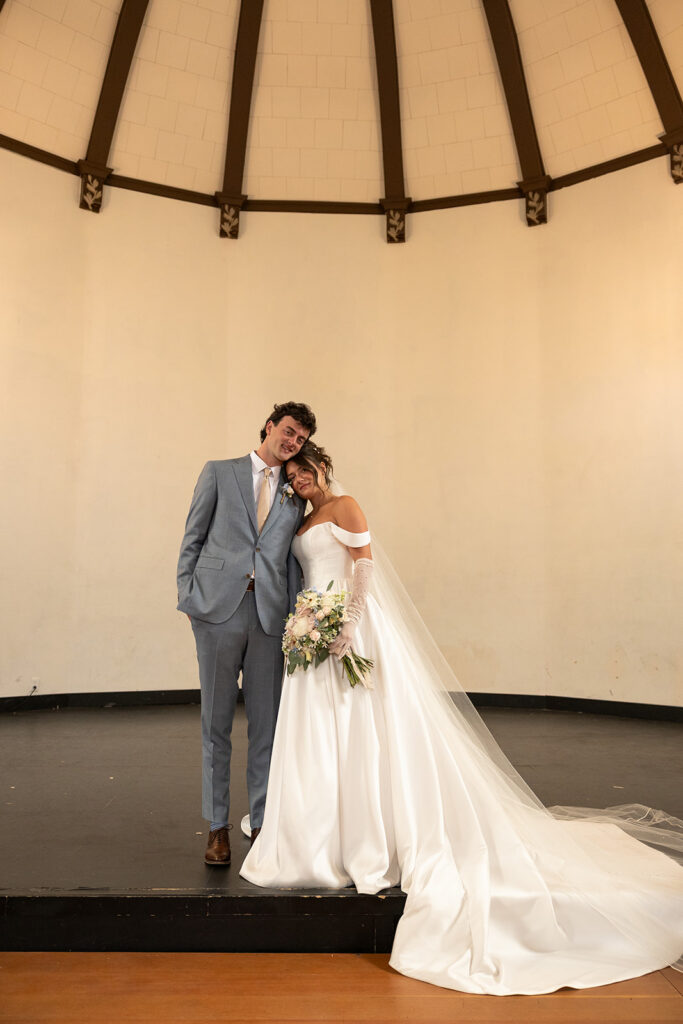 Best Places to Elope in Idaho | | Love in the Hills Photo & Video Bride and groom standing together indoors after their ceremony at one of the best places to elope in Idaho.